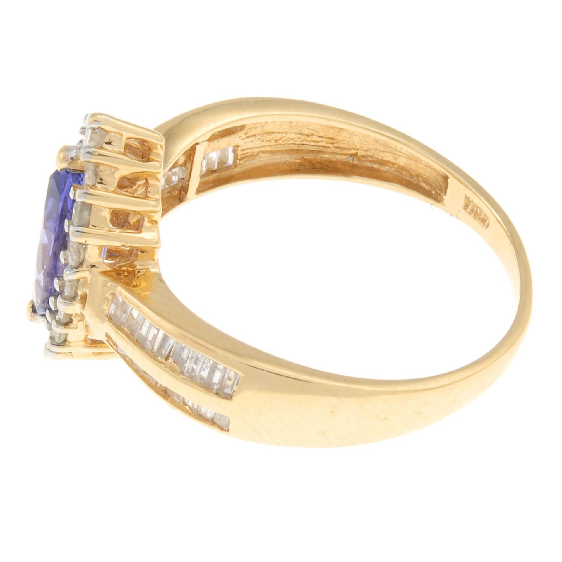 A tanzanite and vari-cut diamond cluster ring.Estimated total diamond weight 0.50ct.Stamped - Image 2 of 3