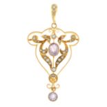 An early 20th century 15ct gold amethyst and split pearl pendant.Stamped 15ct.Length 5.2cms.