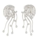 A pair of vari-cut diamond abstract earrings.Estimated total diamond weight 1.20cts.