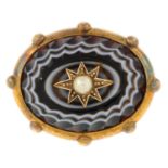 A late 19th century gold banded agate and split pearl brooch.Length 3.6cms.