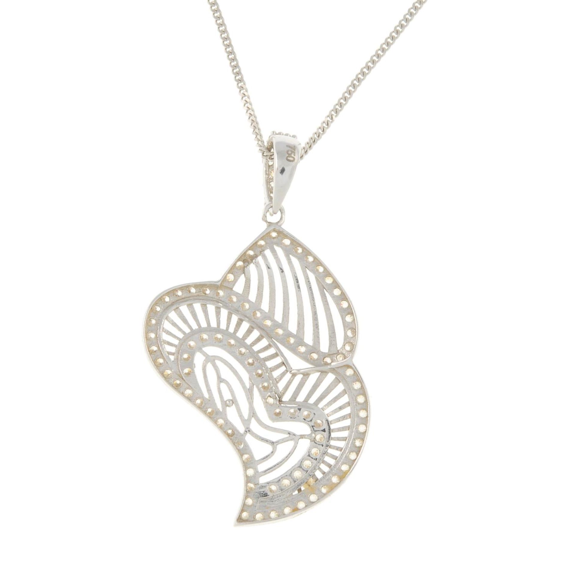 A cubic zirconia abstract pendant, with 9ct gold chain.Pendant stamped 750. - Image 2 of 2