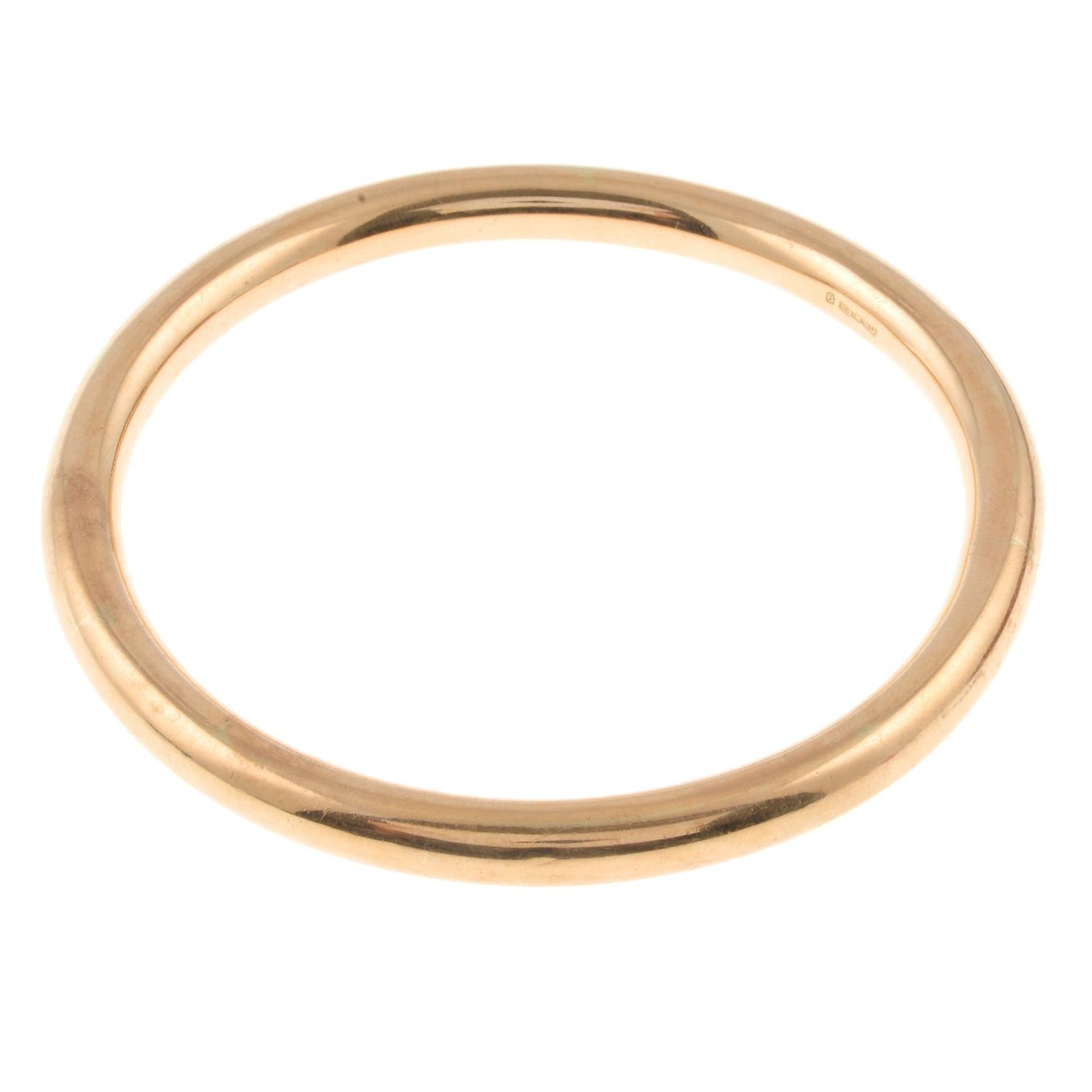 A bangle. Stamped 9.