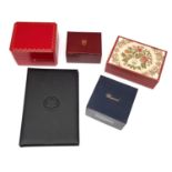 A group of twelve assorted watch boxes, to include examples by Cartier, Mont Blanc and Chopard.