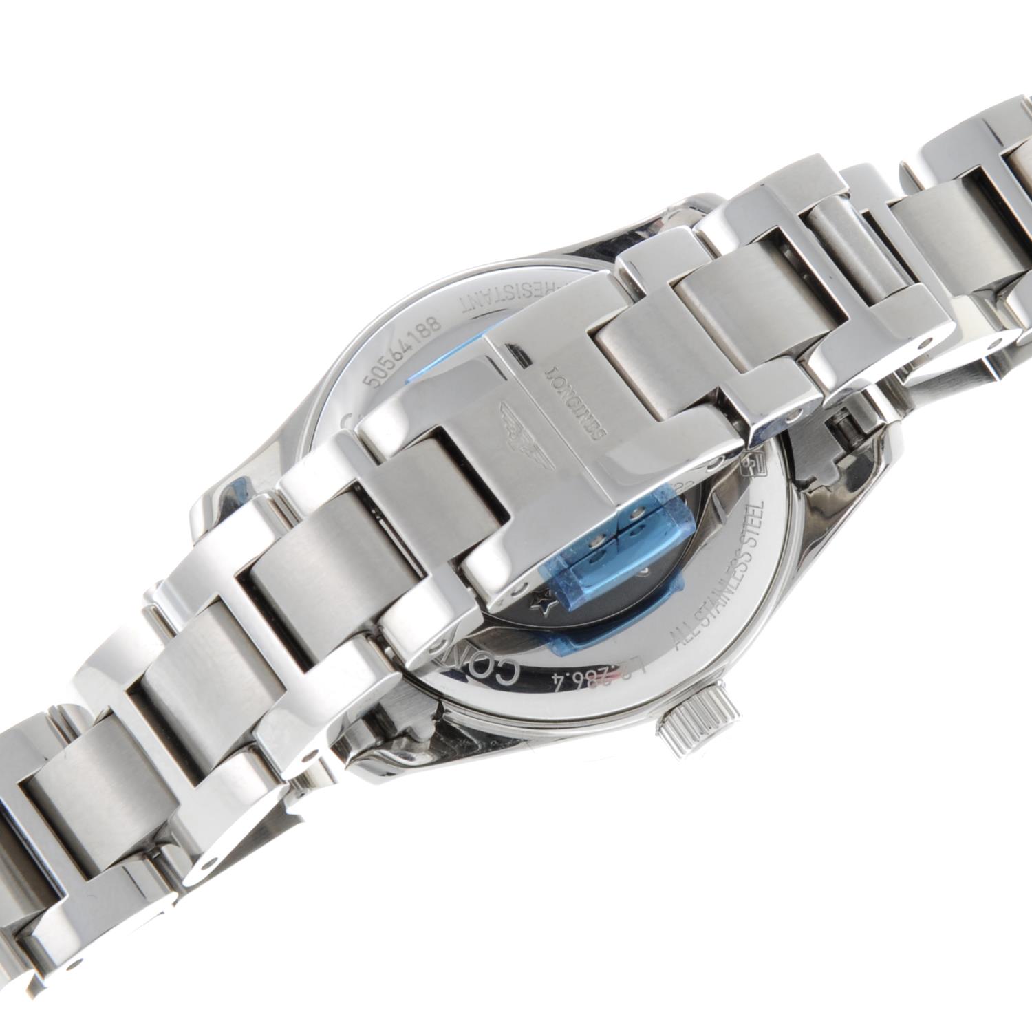 CURRENT MODEL: LONGINES - a lady's stainless steel Conquest Classic bracelet watch. - Image 2 of 4