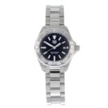 CURRENT MODEL: TAG HEUER - a lady's Aquaracer bracelet watch.