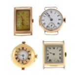 A group of four assorted yellow metal and yellow gold watch heads,