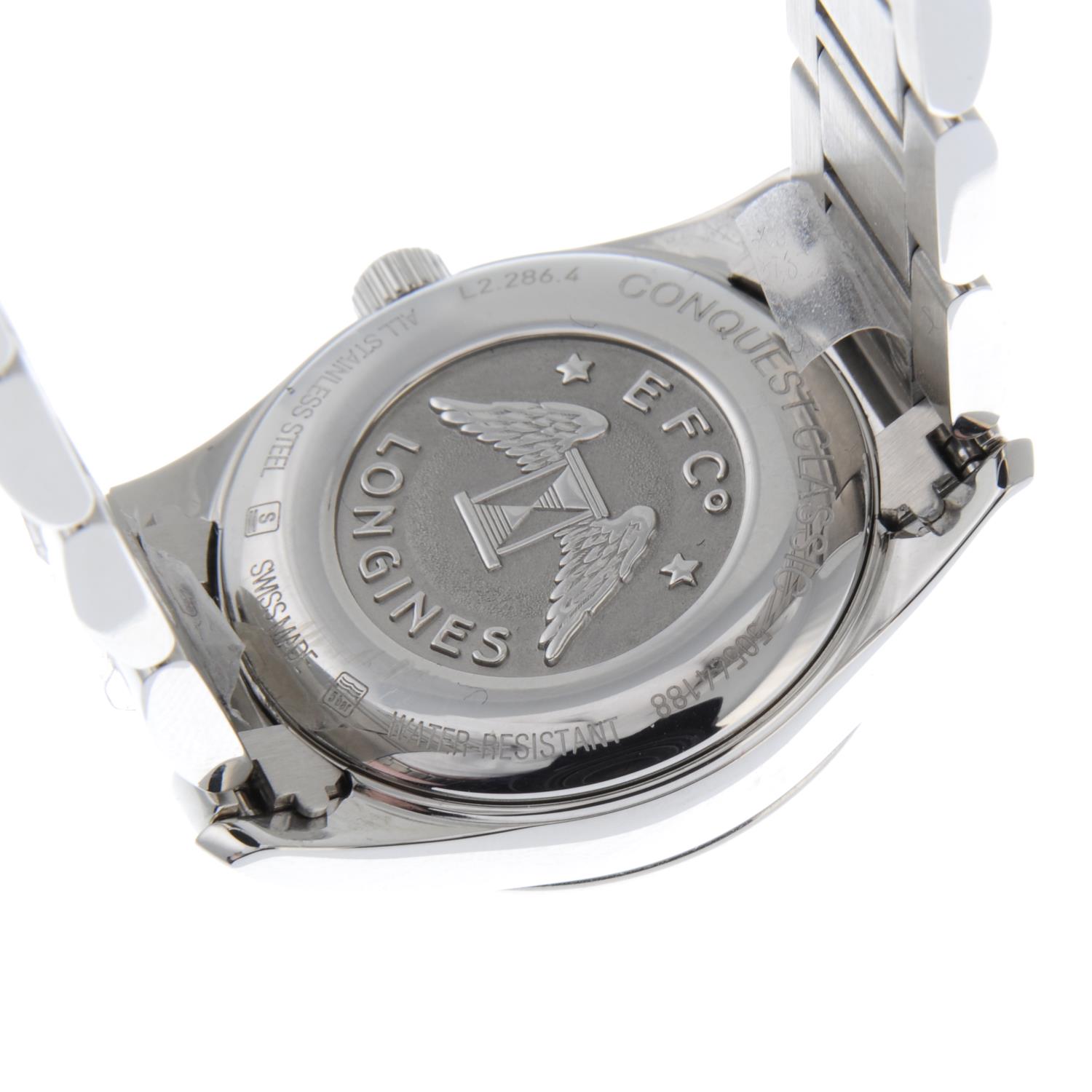 CURRENT MODEL: LONGINES - a lady's stainless steel Conquest Classic bracelet watch. - Image 4 of 4