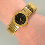 A 'Tubogas' wrist watch, with black dial, by Bulgari.Italian marks, stamped 750.