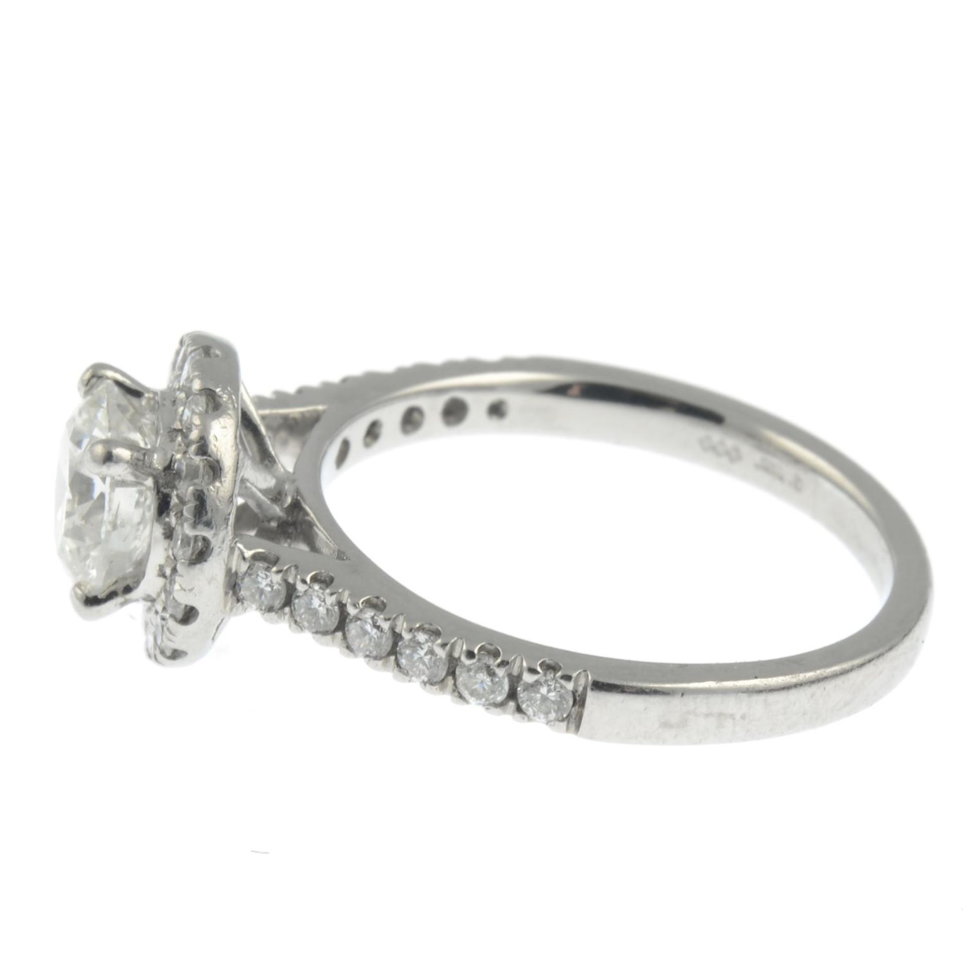 A platinum brilliant-cut diamond halo cluster ring. - Image 7 of 7