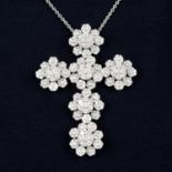 A diamond cluster cross pendant.