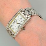 A pavé-set diamond wristwatch.