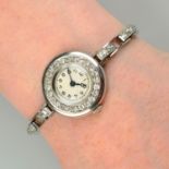 A mid 20th century platinum diamond cocktail watch.