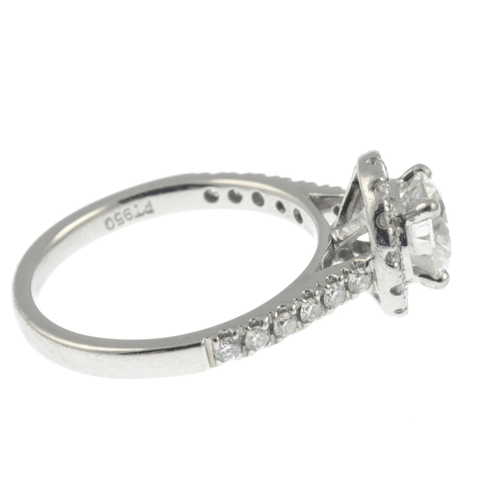 A platinum brilliant-cut diamond halo cluster ring. - Image 6 of 7