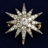 A late Victorian silver and gold old-cut diamond star brooch.