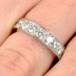 A brilliant-cut diamond full eternity ring.