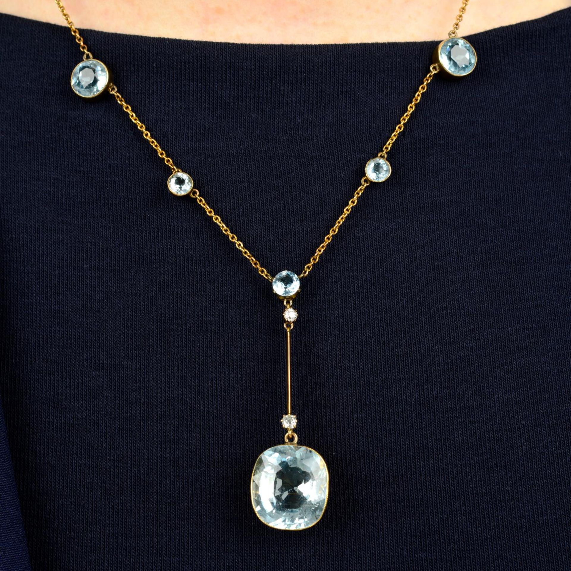 An early 20th century 15ct gold aquamarine and diamond necklace.