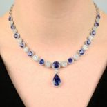 An 18ct gold tanzanite and diamond cluster necklace.