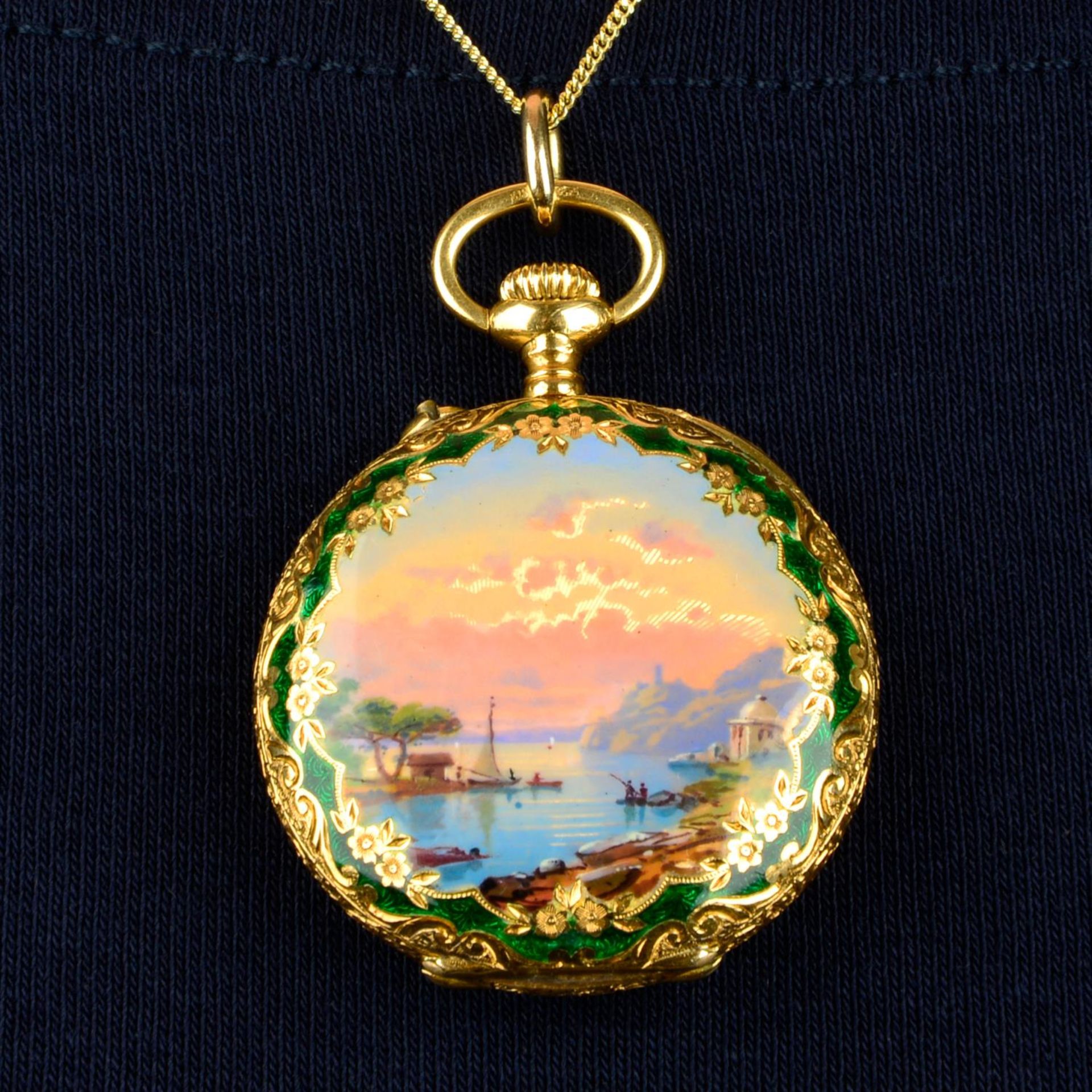 An early 20th century 18ct gold enamel half hunter pocket watch, depicting a seaside sunset.