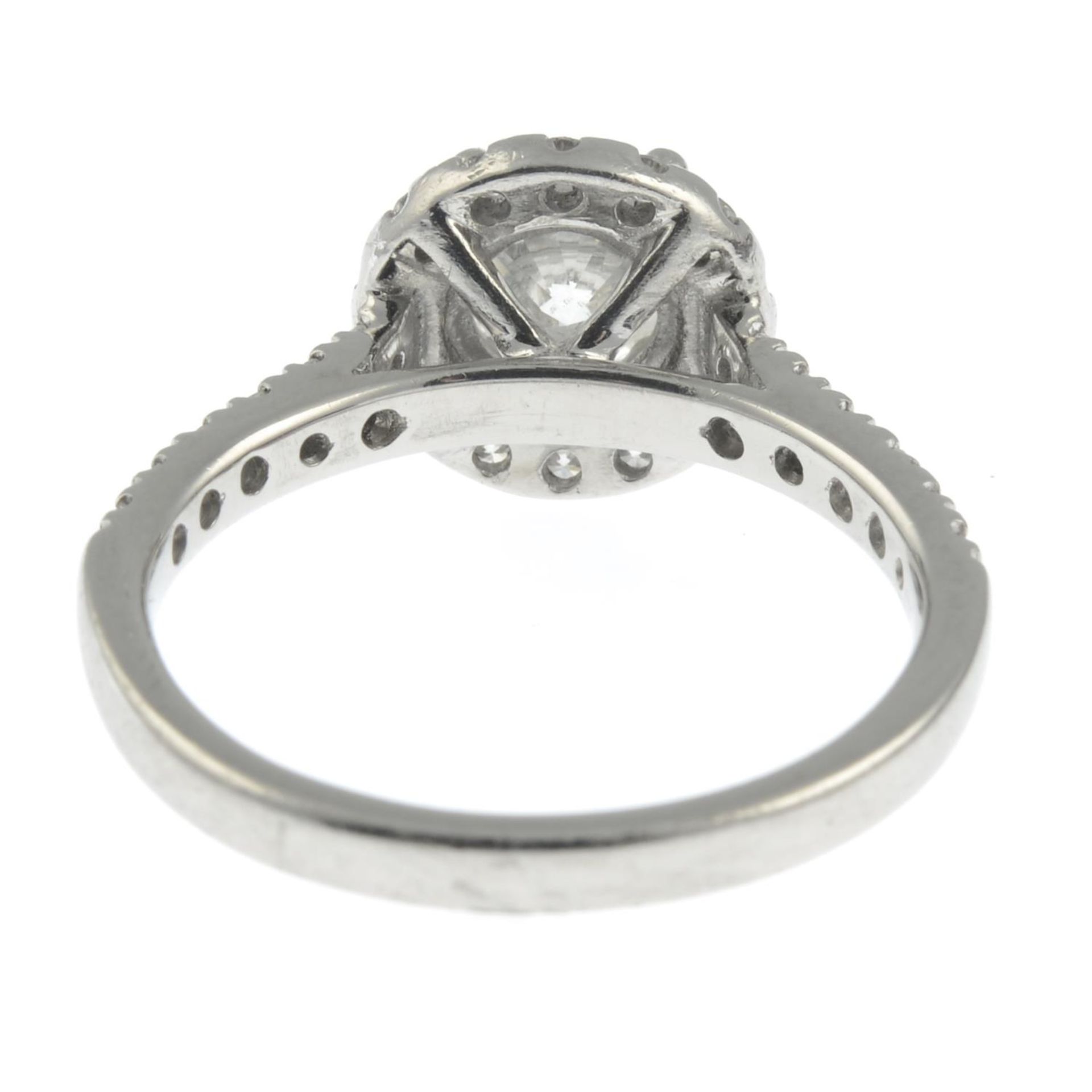 A platinum brilliant-cut diamond halo cluster ring. - Image 4 of 7