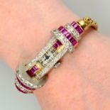 A 1940s gold and platinum, calibré-cut ruby and diamond cocktail watch.