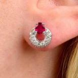 A pair of 18ct gold ruby and diamond earrings.Ruby total weight 0.85ct.Total diamond weight 0.51ct,