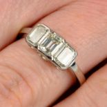 A rectangular-shape diamond three-stone ring.Estimated total diamond weight 1ct,