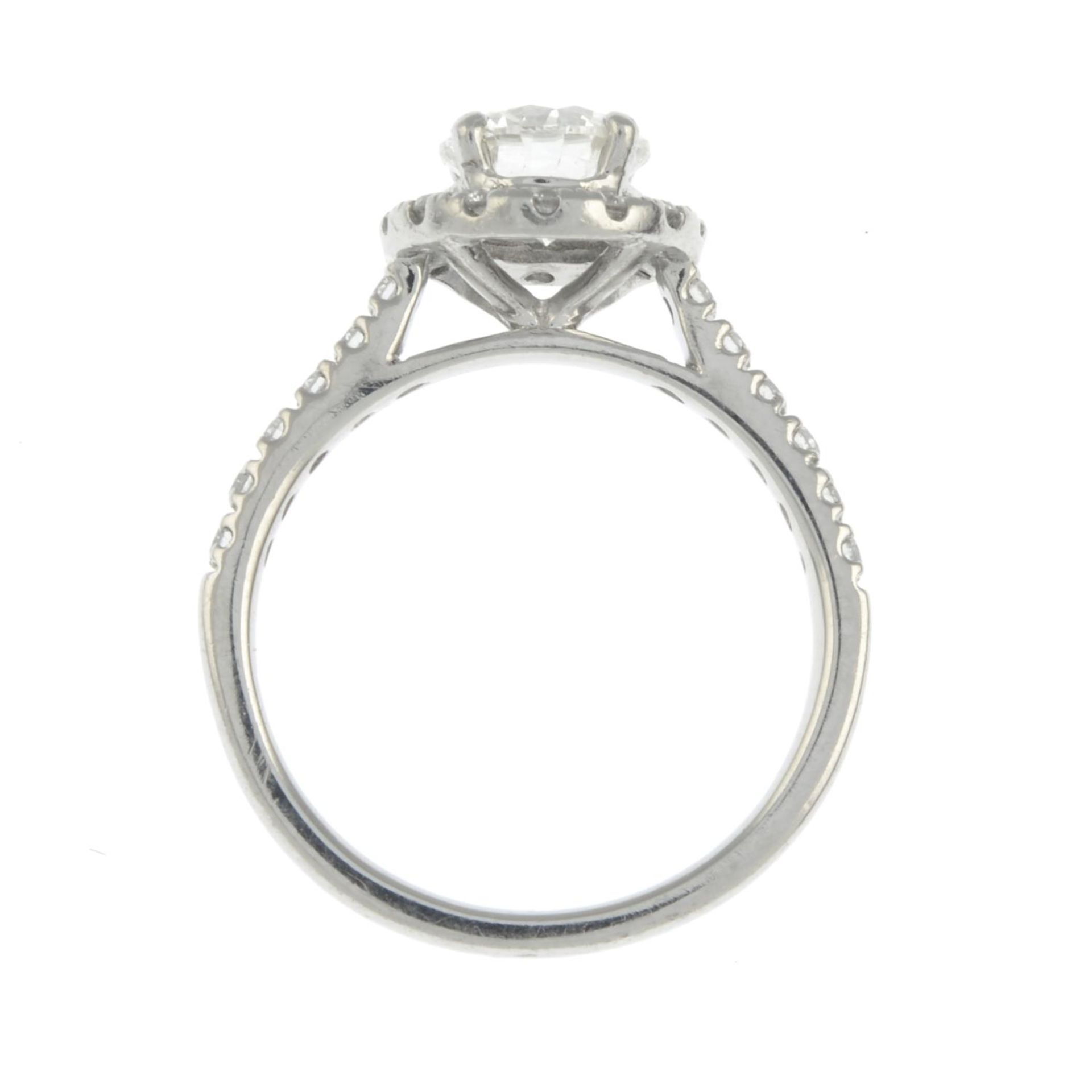 A platinum brilliant-cut diamond halo cluster ring. - Image 5 of 7