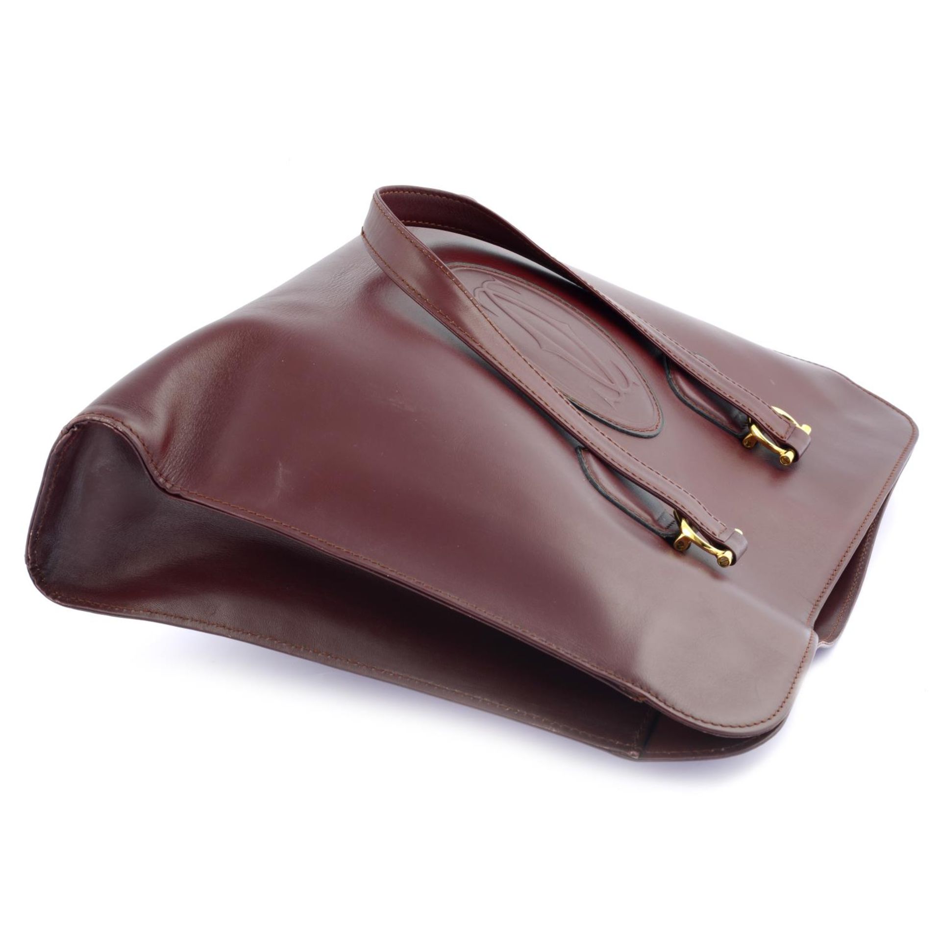 CARTIER - a burgundy leather Vintage Shopper handbag. - Bild 3 aus 4