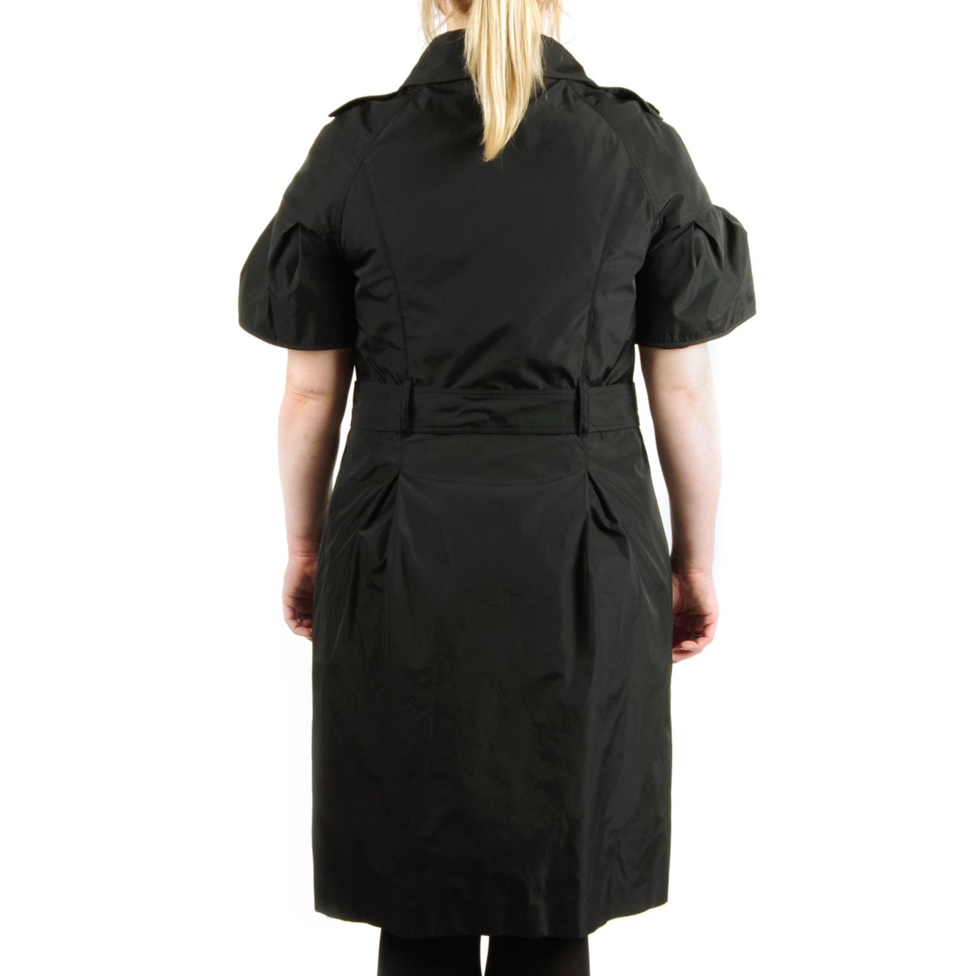 BURBERRY - a black short sleeved raincoat. - Image 2 of 2