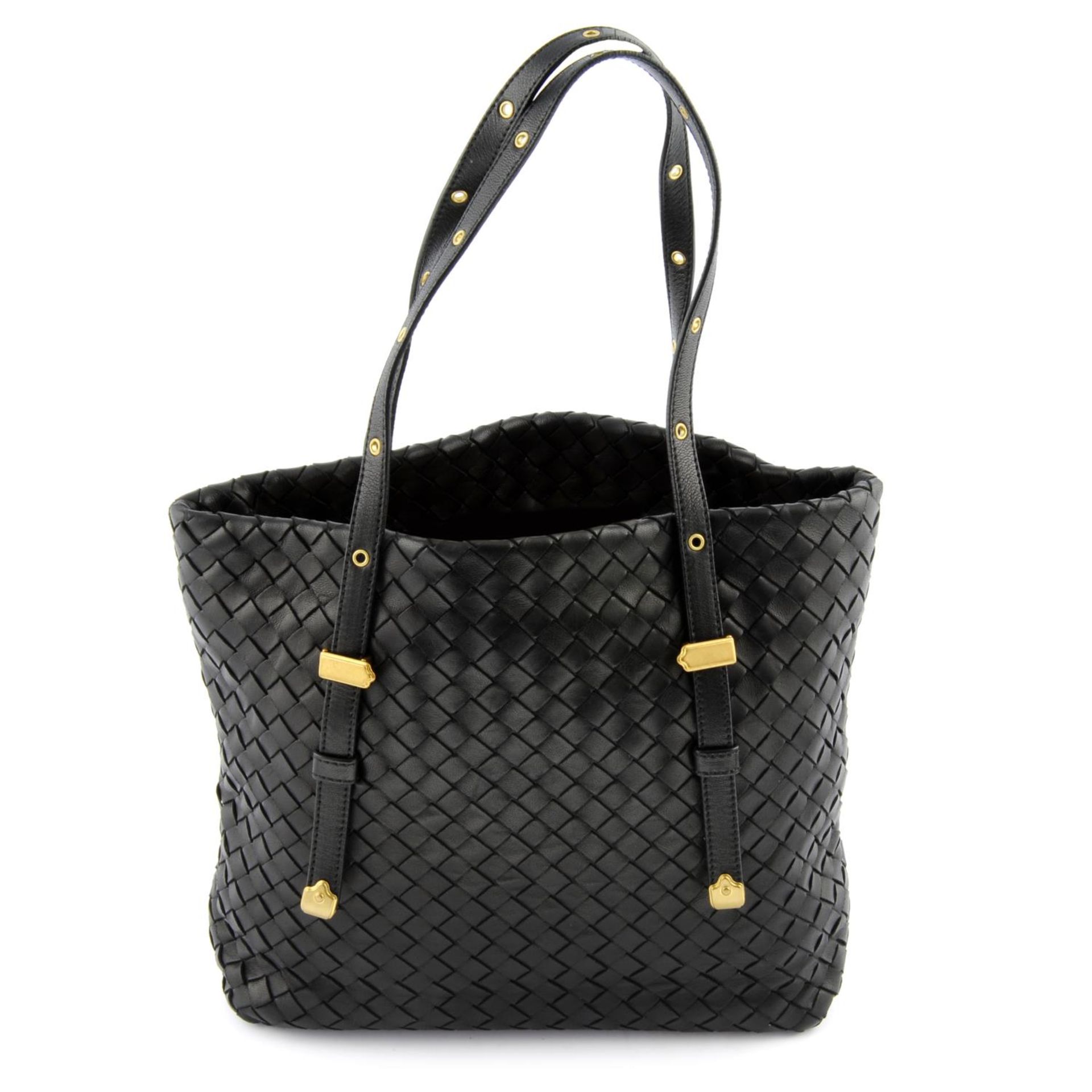 BOTTEGA VENETA - a black intrecciato leather handbag.