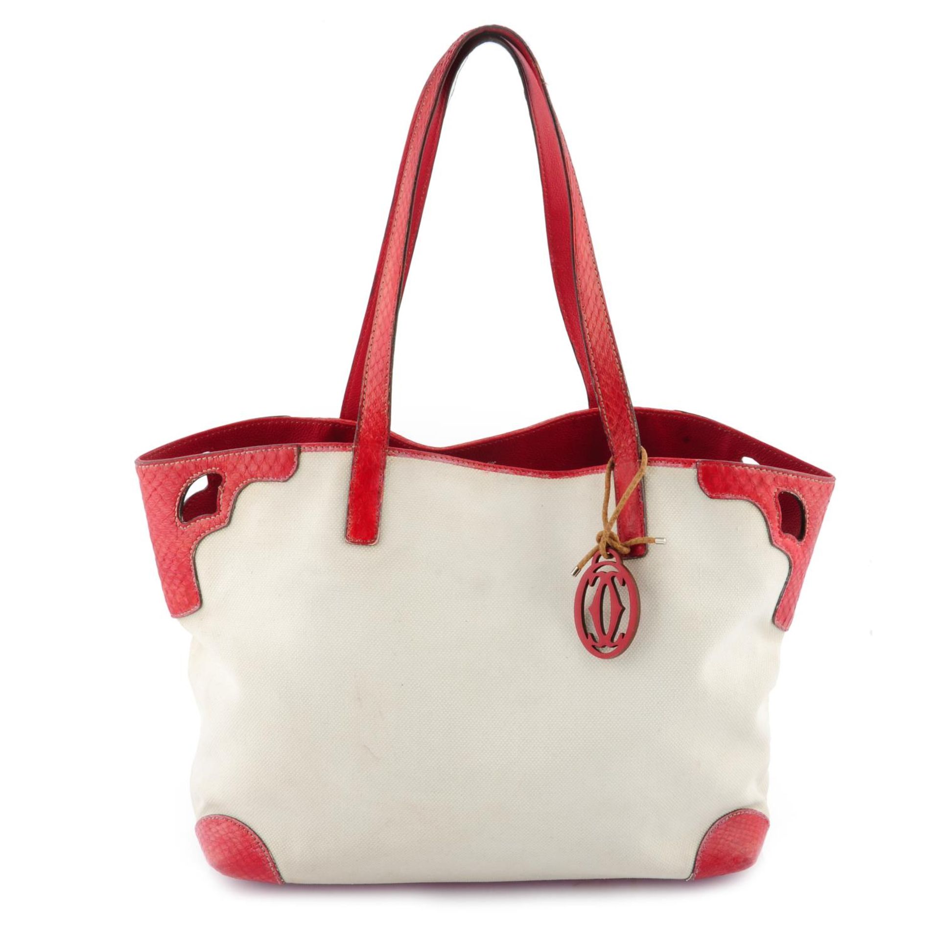 CARTIER - a white and red Marcello de Cartier handbag.