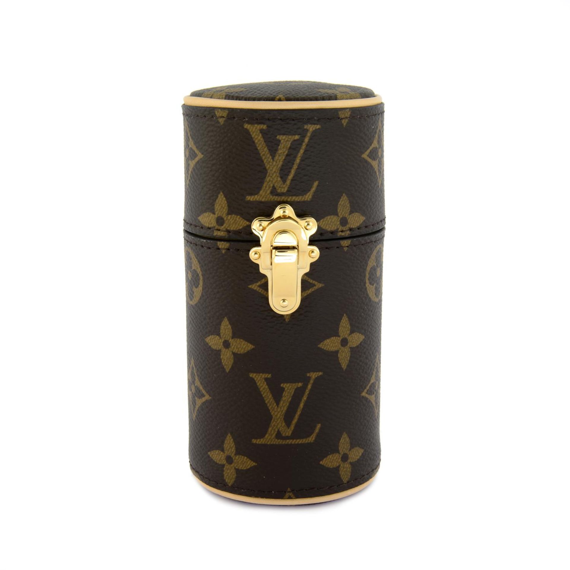 LOUIS VUITTON - a Monogram perfume travel case.