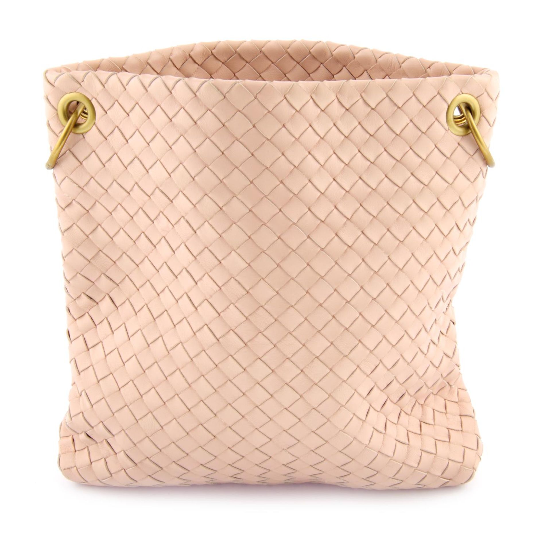 BOTTEGA VENETA - a blush pink Intrecciato crossbody handbag.