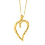 TIFFANY & CO. - An open leaf pendant, with non-designer chain.Stamped 750 and 18K.