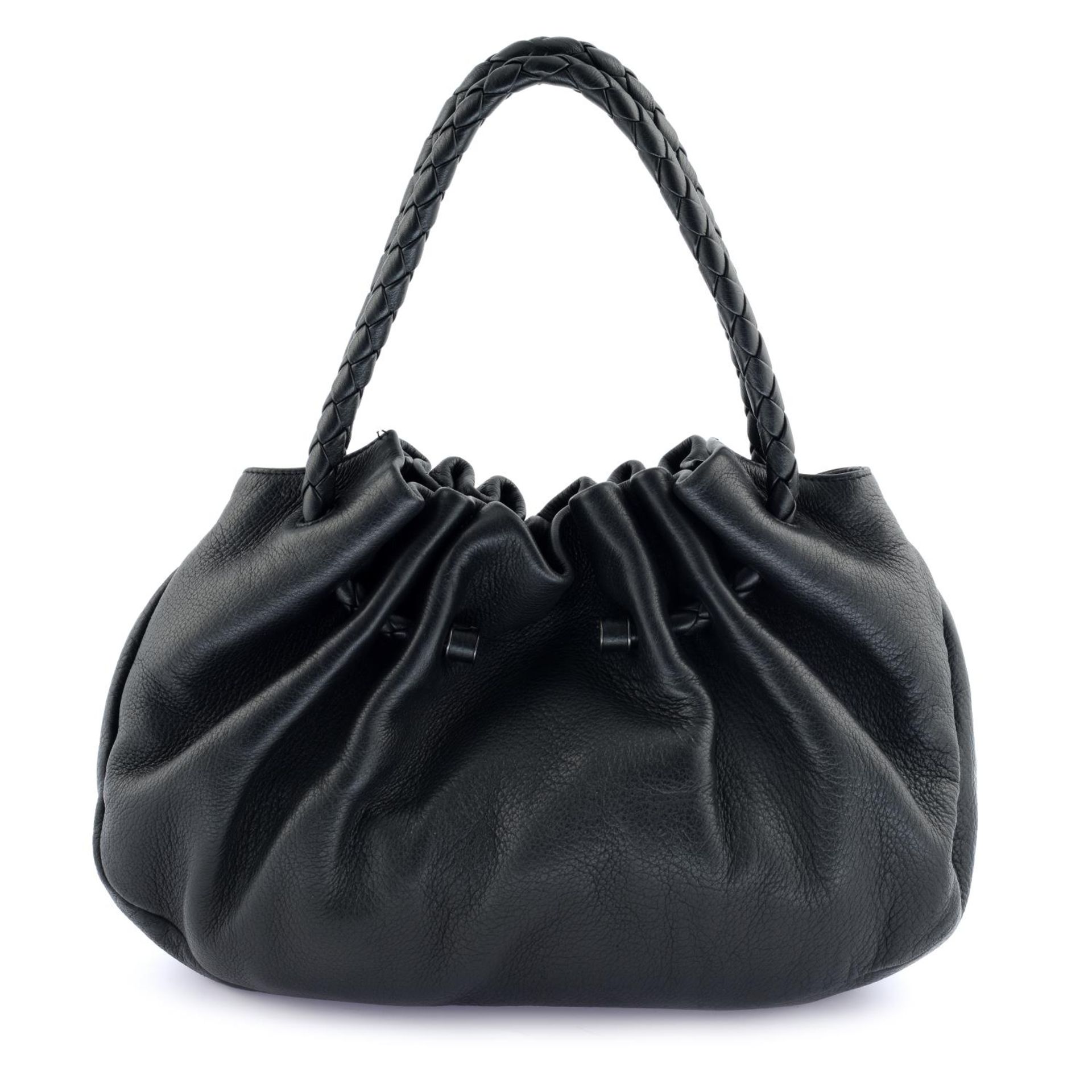 BOTTEGA VENETA - a black leather handbag.