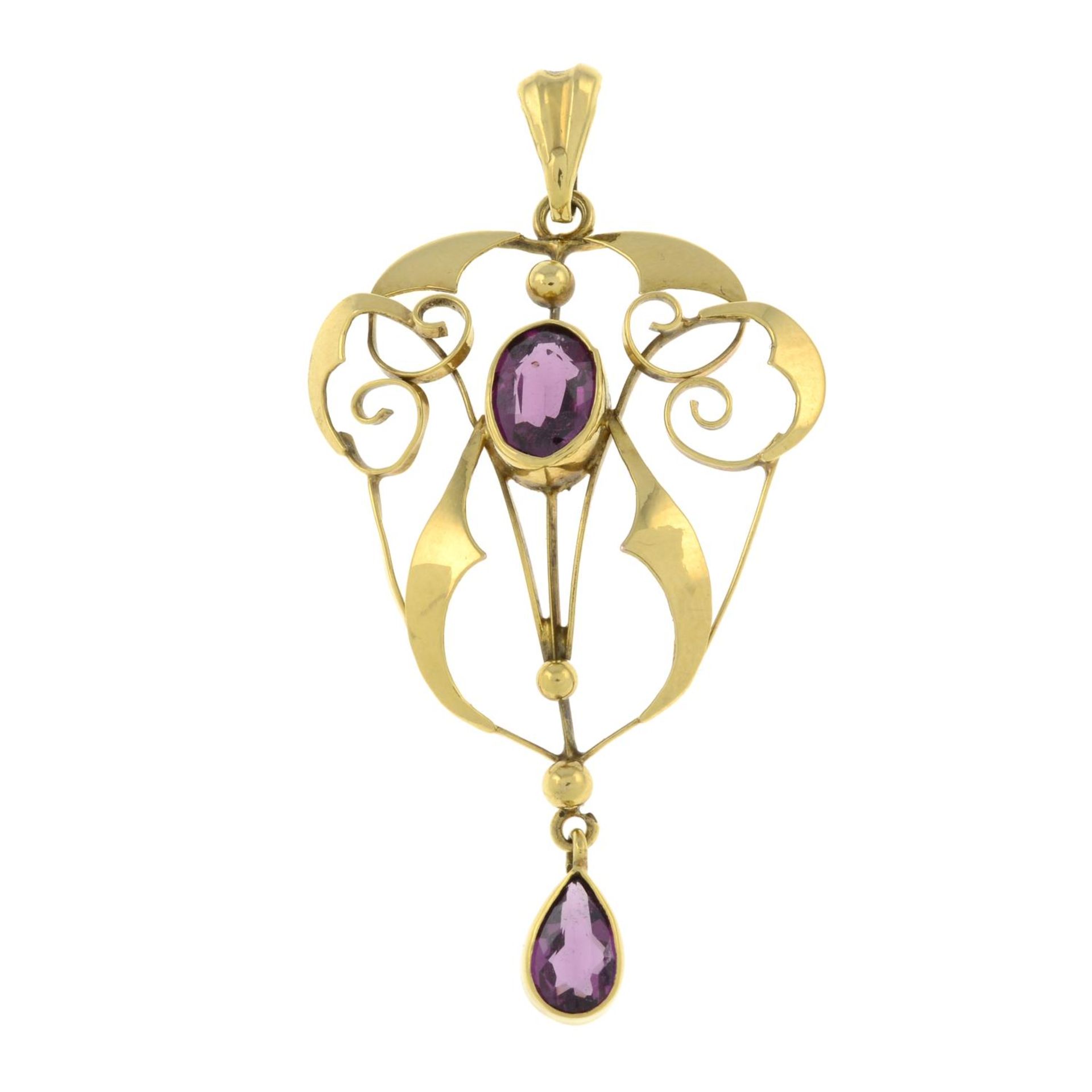 An early 20th century 9ct gold garnet pendant.Stamped 9ct.Length 5.2cms.