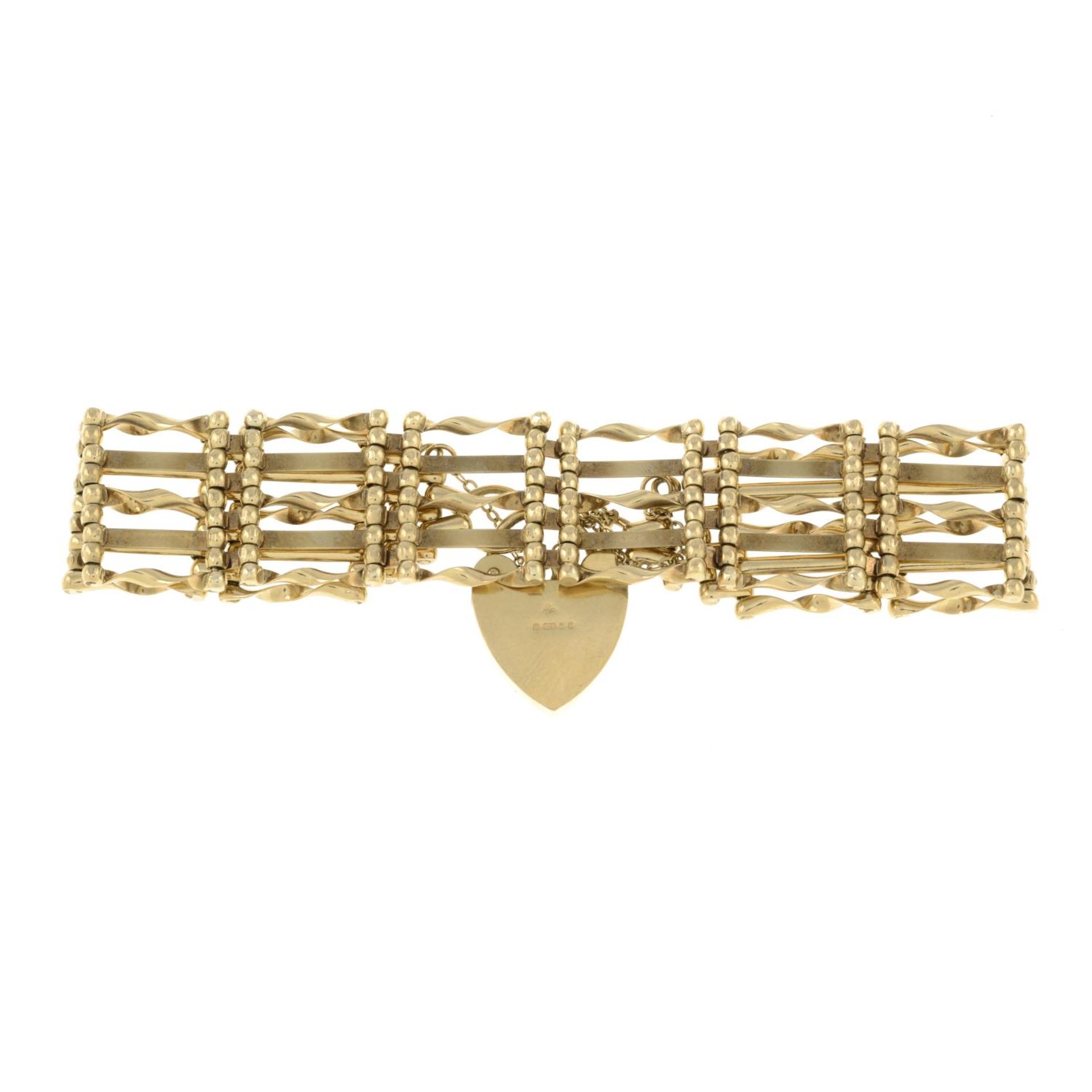 A 9ct gold gate-link bracelet, with heart padlock clasp.Hallmarks for London, 1976.Length 18cms. - Image 2 of 2