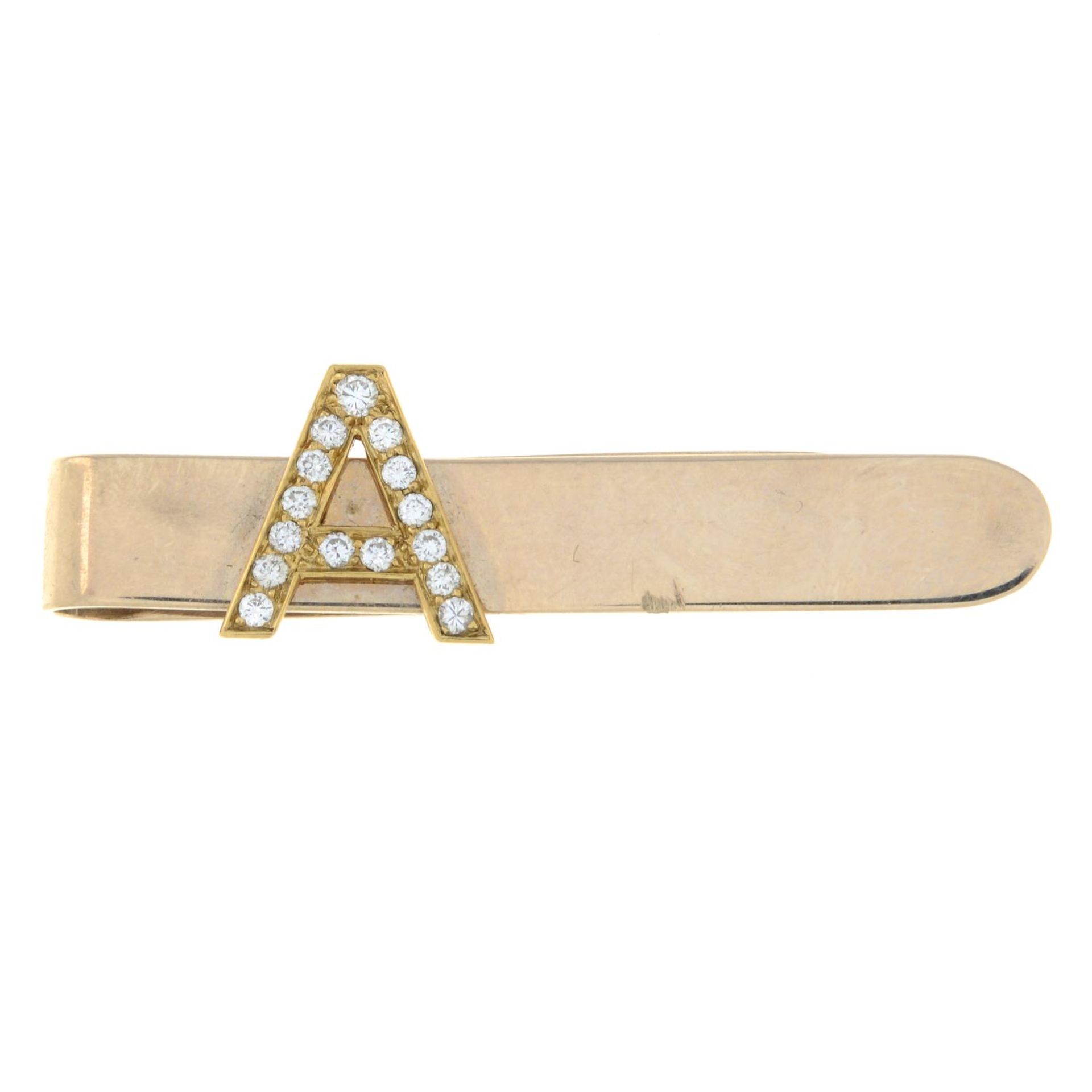 A diamond initial 'A' tie slide.