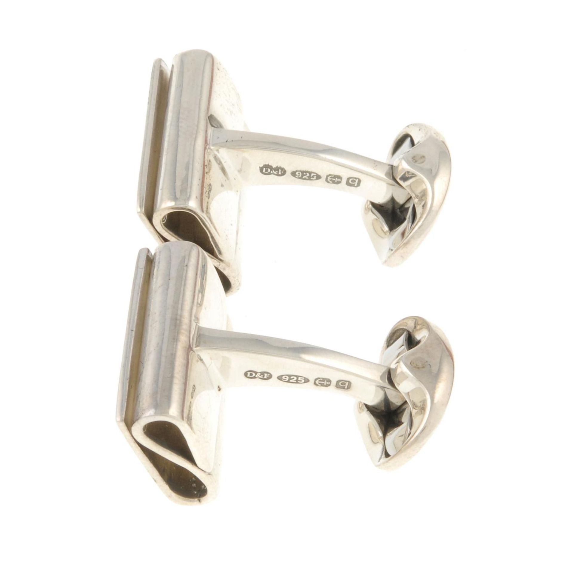 A pair of silver cufflinks, - Image 2 of 3