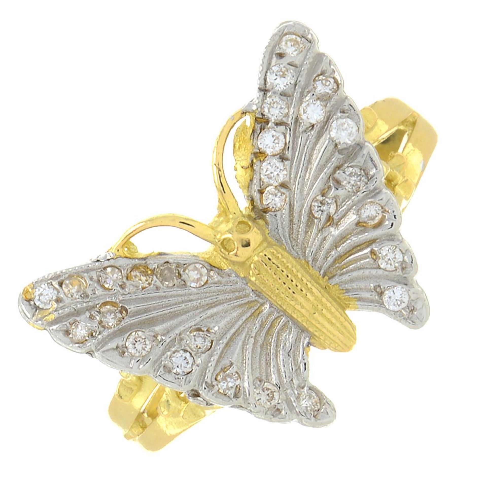 A vari-cut diamond butterfly ring.Estimated total diamond weight 0.15ct.Ring size N.