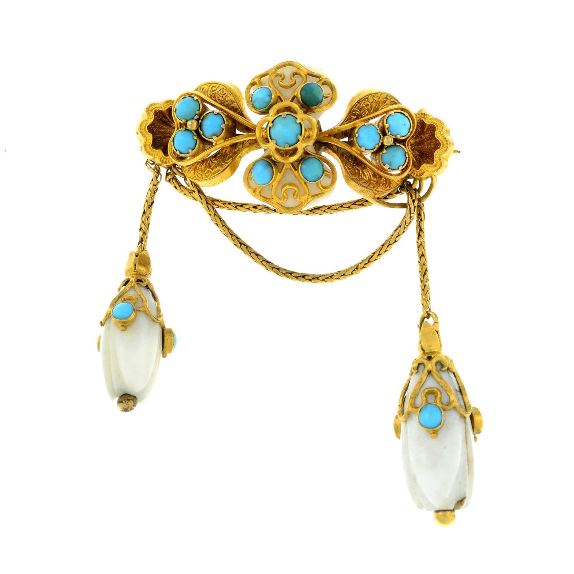 A late 19th century turquoise and ivory brooch.Length 6.5cms.