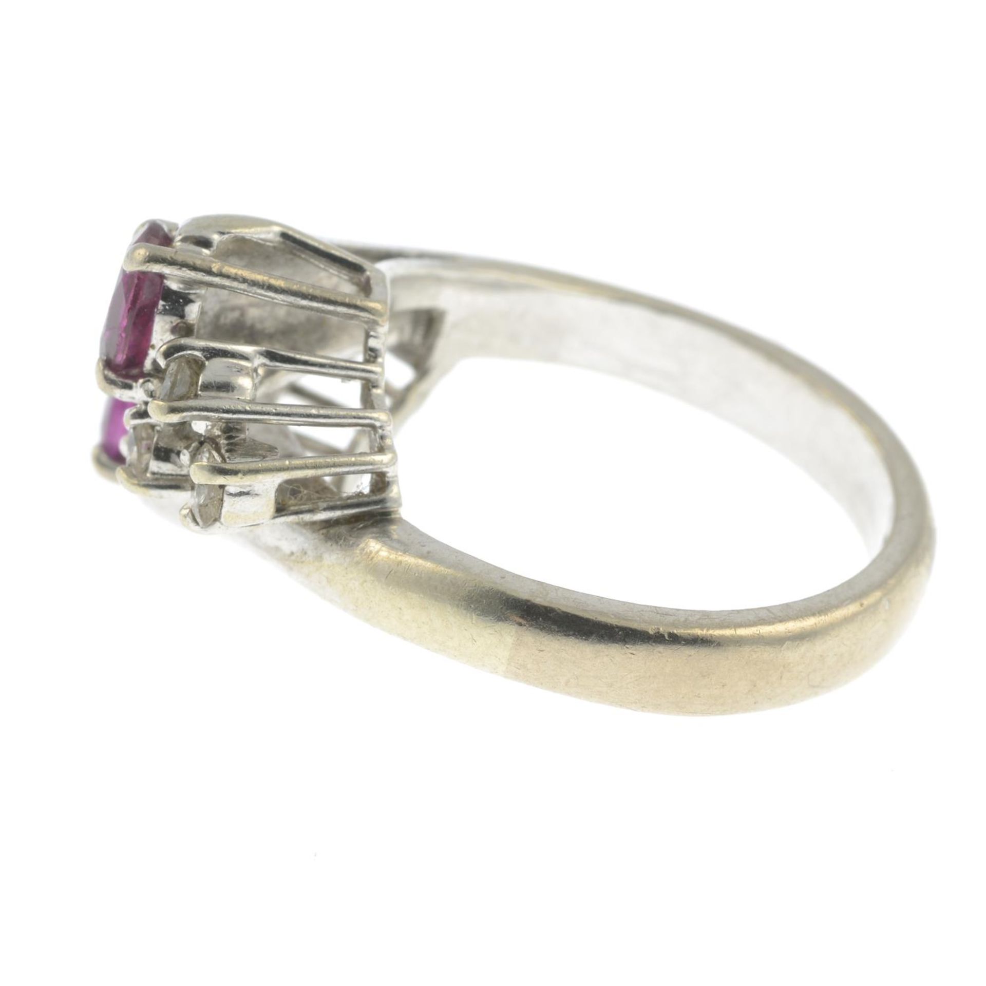 A ruby and brilliant-cut diamond crossover ring.Estimated total diamond weight 0.20ct, - Image 2 of 4