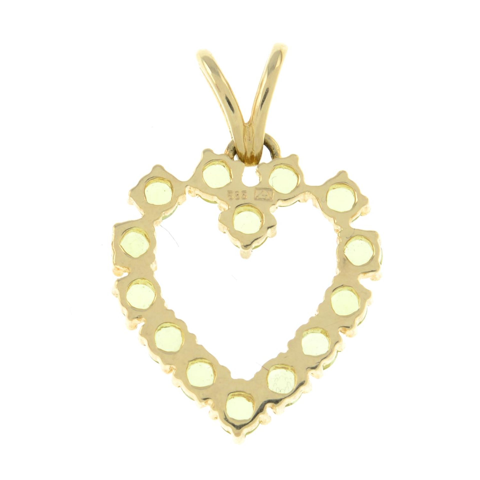 A chrysoberyl heart pendant.Stamped 585.Length 2.7cms. - Image 2 of 2