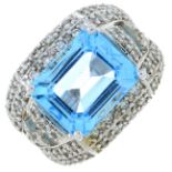 A blue topaz and diamond dress ring.Blue topaz calculated weight 5.66cts,
