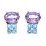 A pair of amethyst and topaz earrings.Stamped 750.Length 1.1cms.