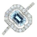 An aquamarine and diamond dress ring.Aquamarine calculated weight 0.61ct,