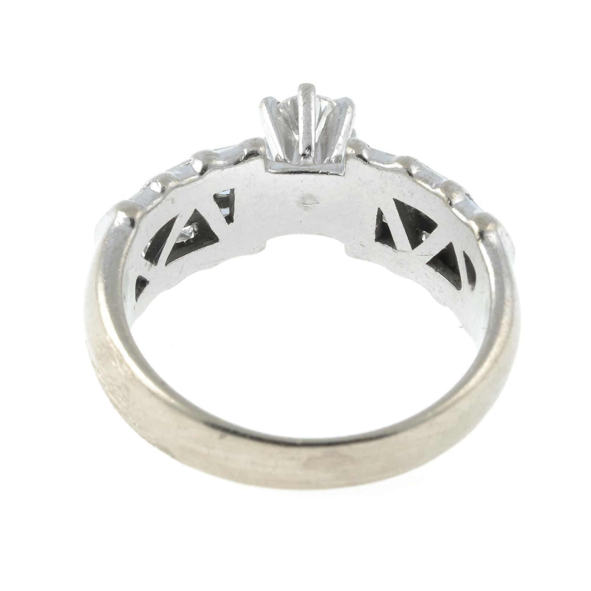 A brilliant and baguette-cut diamond dress ring.Diamond deficient. - Image 2 of 3