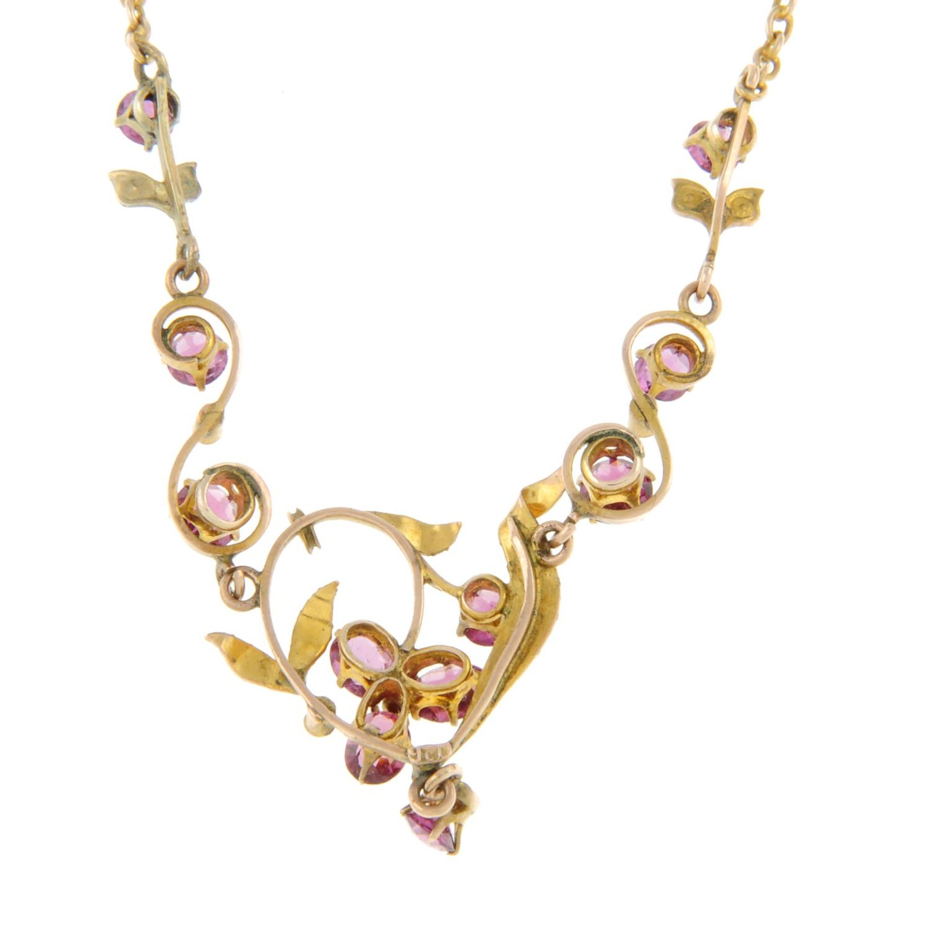 An early 20th century 9ct gold garnet and split pearl necklace. - Image 2 of 3