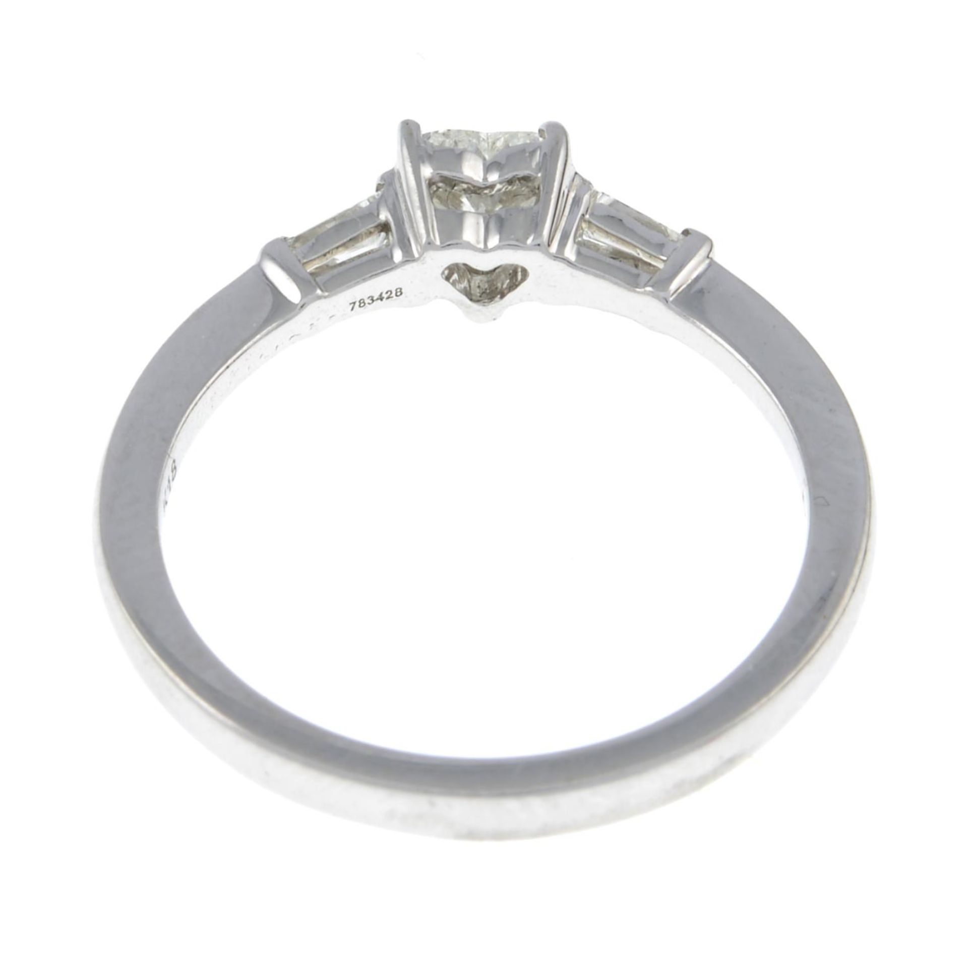 A heart-shape and baguette-cut diamond three-stone ring.Total diamond weight 0.44ct, - Image 3 of 3