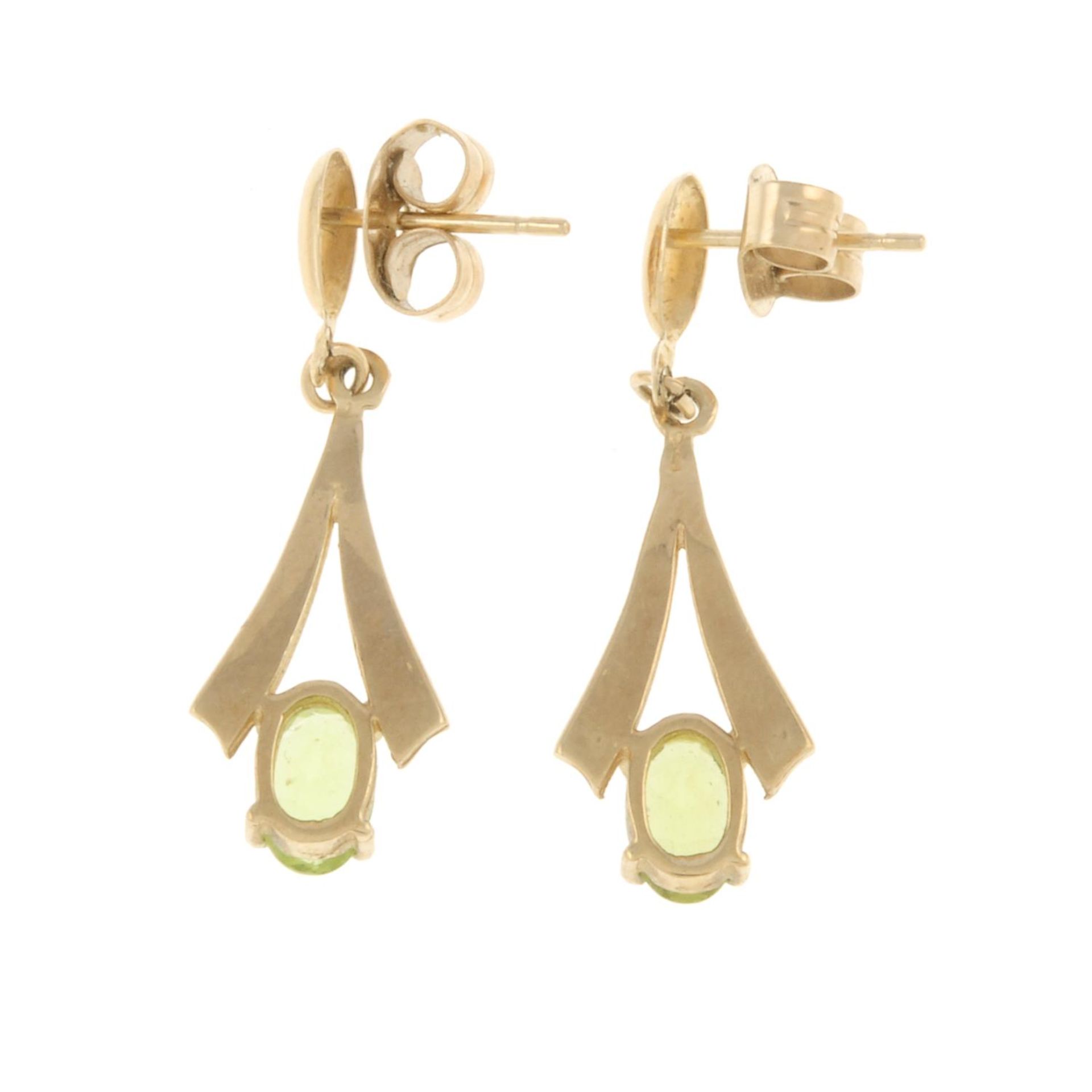 A pair of peridot drop earrings.Length 2.7cms. - Image 2 of 2